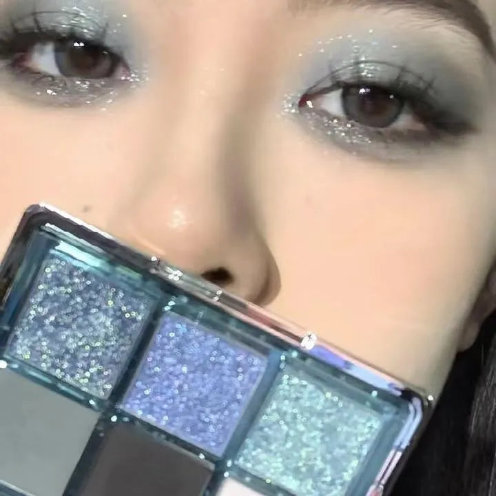 MUGELEEN nine-colour eye shadow palette in blue smoked and earth tones with matte shimmer finishes