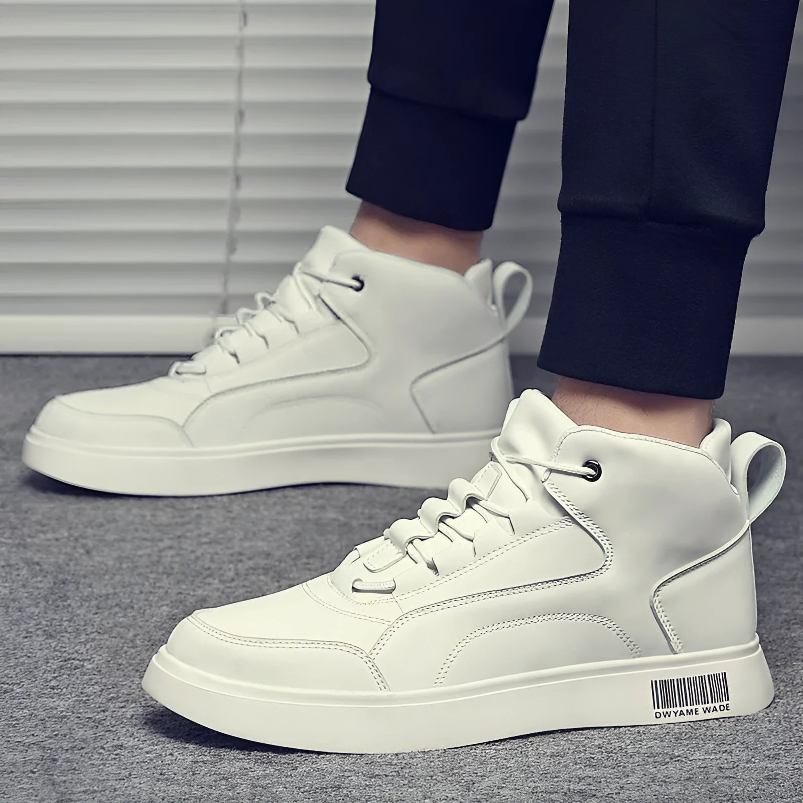Men's white mid-top casual lace-up shoes with round toe and rubber sole.