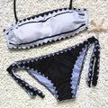 Sexy black strapless bikini set for women with tie side bottom and gathered front top