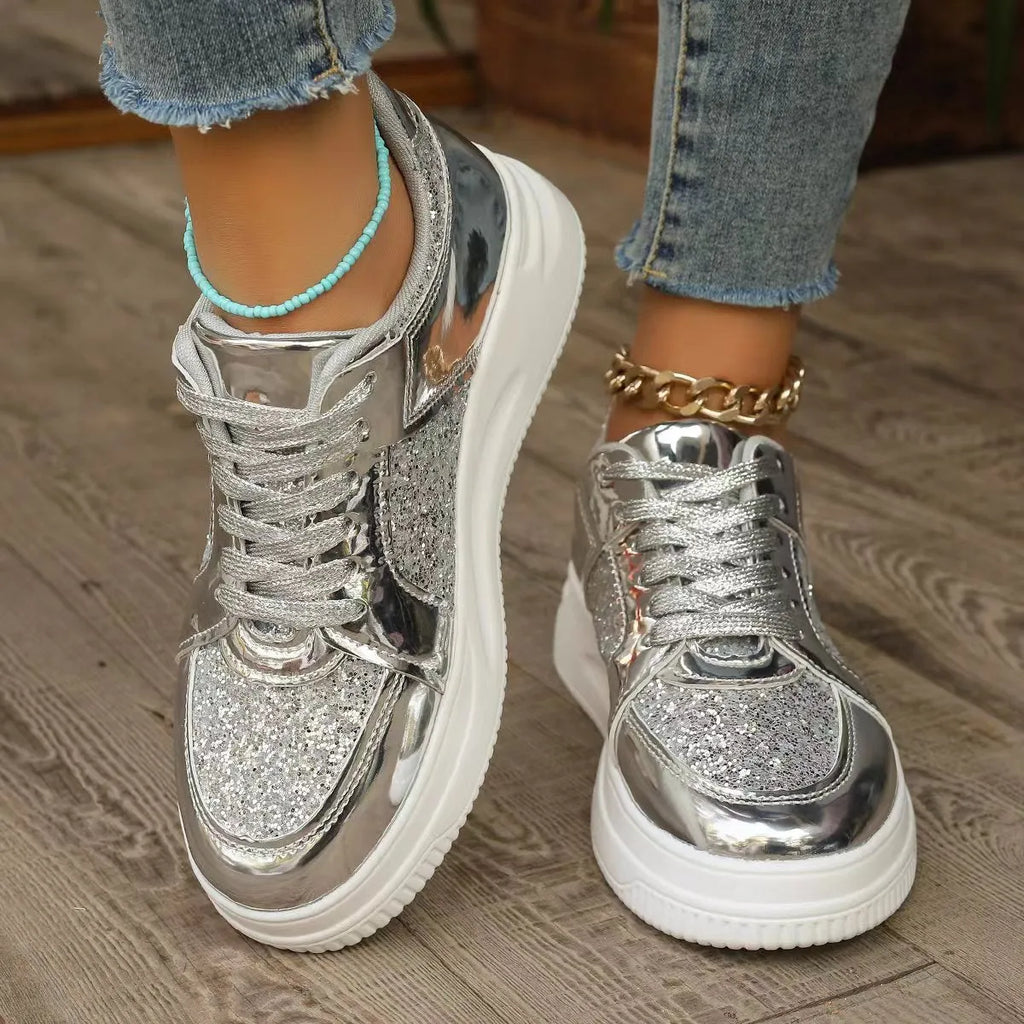 Women's fashion lace-up flat shoes with sequin design, round toe, thick bottom, in silver colour, on a plain background