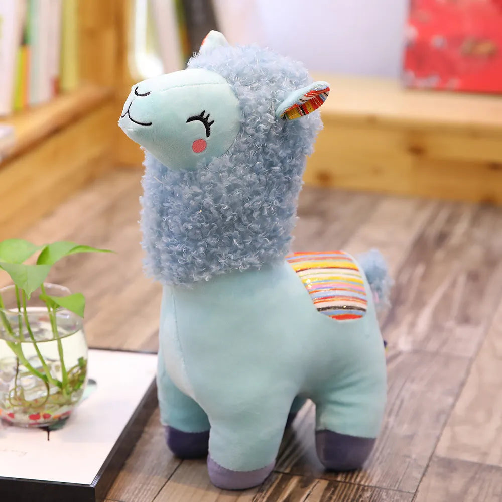 Alpaca llama plush toy in white standing on a surface