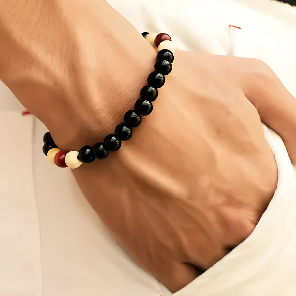 Natural lava stone bead bracelet with ethnic style design on wrist