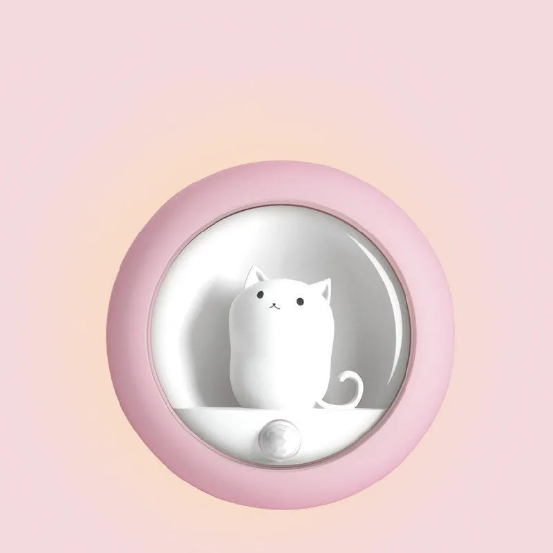 Baby bedside sleep lamp showing orange, pink, and white light options with a projection feature.