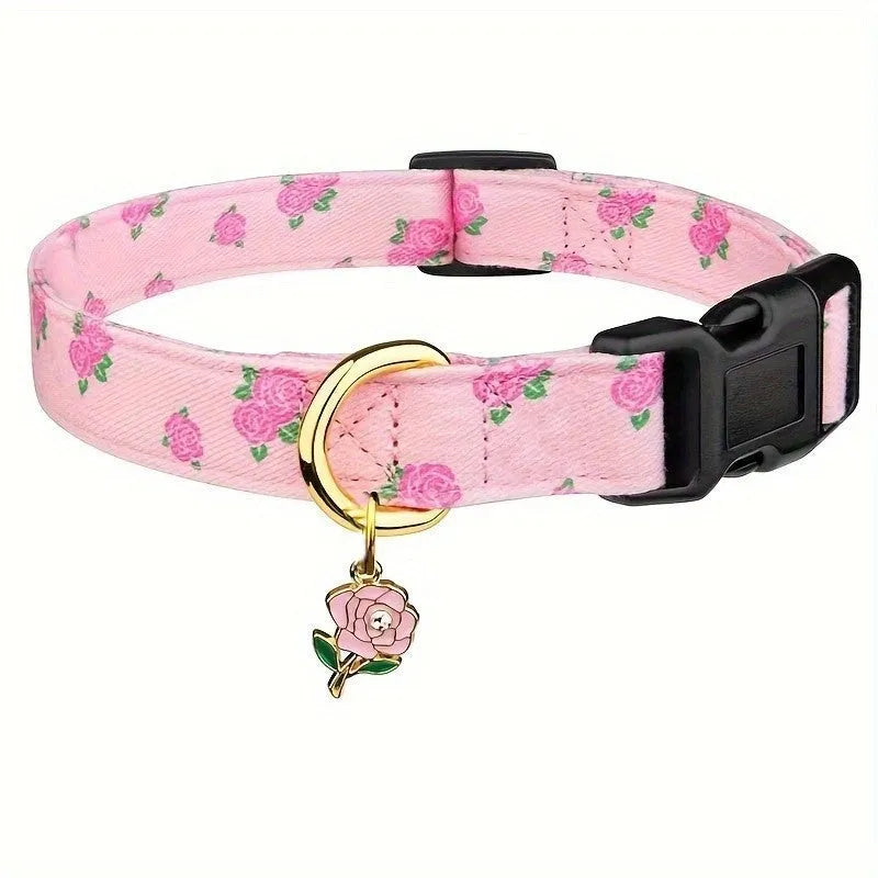Floral polyester adjustable dog collar for traction in a pink colour, shown on a white background
