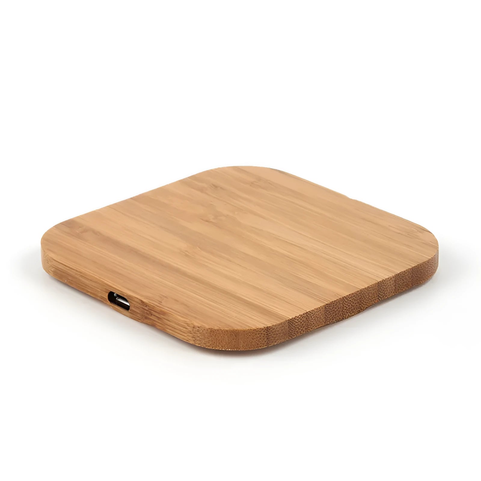 Square bamboo wood 5W wireless charger on a wooden surface.