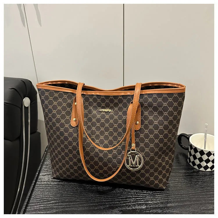 Western style textured PU shoulder bag in black, shown with contrast stitching and an adjustable strap.