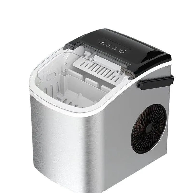 Silver countertop home ice machine with 1.2L capacity and push-button control on a kitchen counter