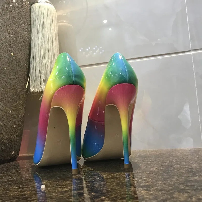 Rainbow glossy patent leather women's ultra-high heel shoes with a pointed toe and thin stiletto.