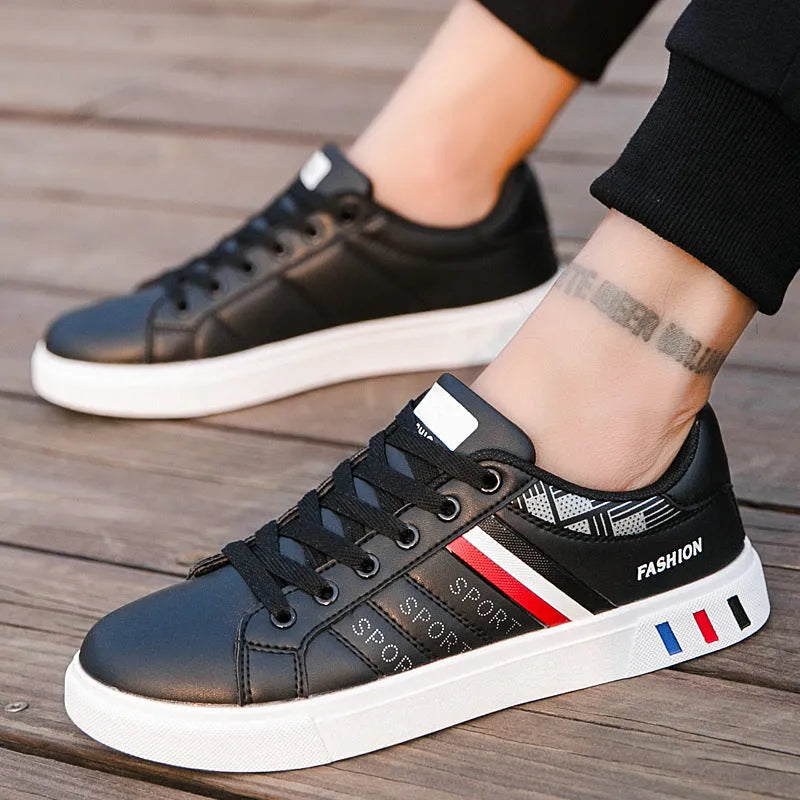 Unisex black sports shoes on a white background, showing the sole, with a sizing chart for codes 39 to 44 visible.
