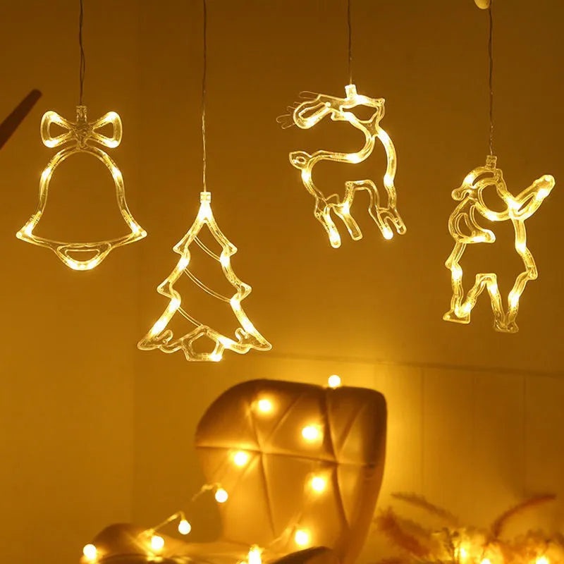 Battery-powered Christmas LED chandelier light with suction cups, showing Santa Claus design.