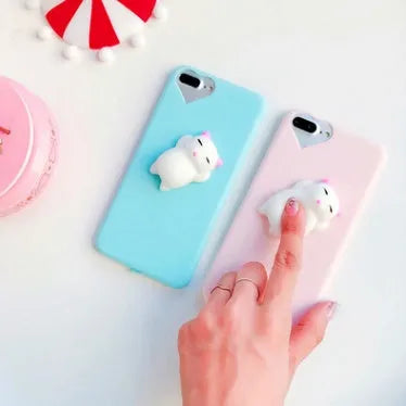 Soft silicone iPhone case with 3D cartoon cat design in black, blue, pink, or white colours