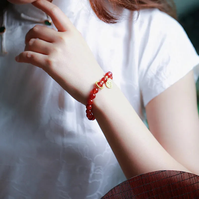Natural red agate bracelet with woven construction and blessing card