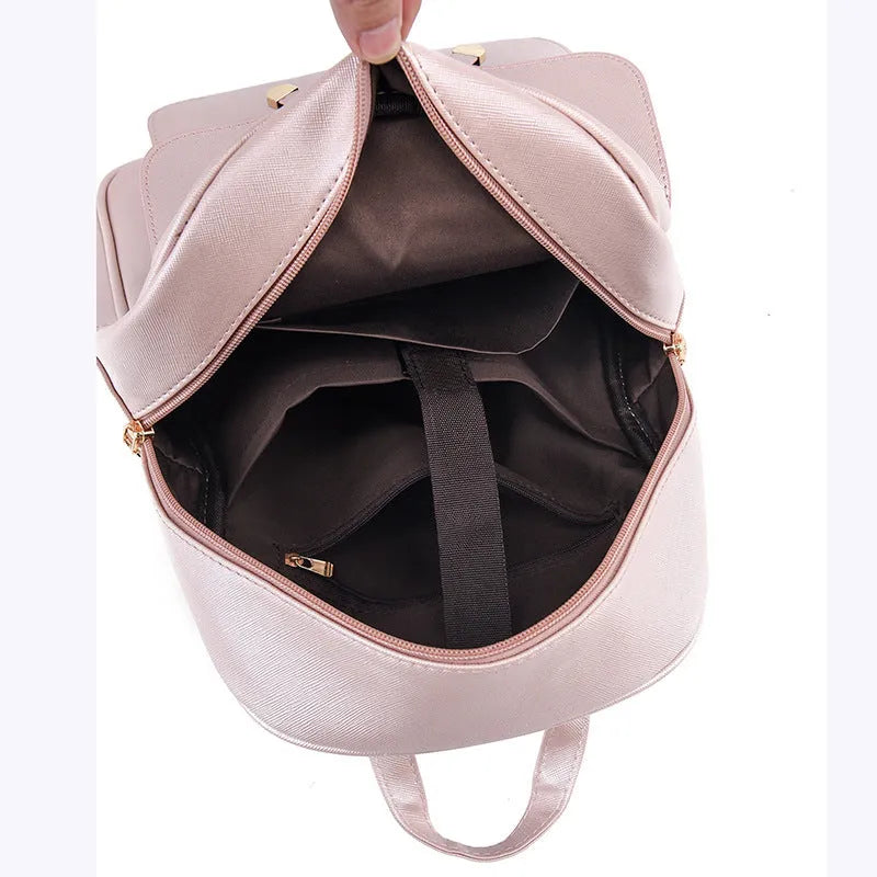 PU leather women's backpack set with bow plaid design in black, showing backpack, shoulder bag, and clutch
