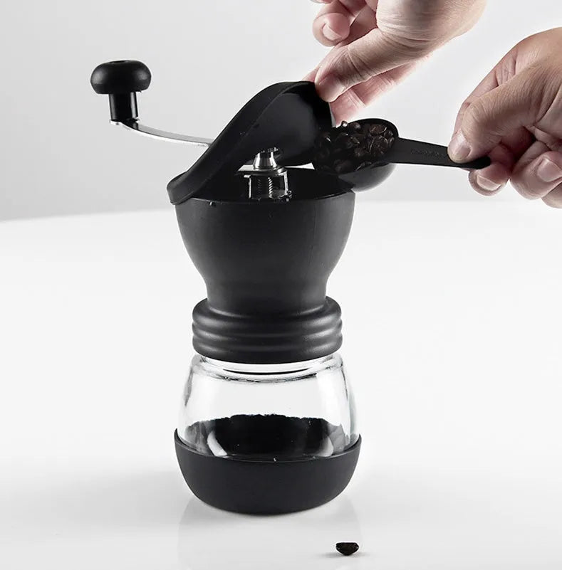 Manual hand coffee grinder with black format, beech wood body, 88 mm width and 160 mm height, front drawer for ground coffee