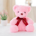 Plush teddy bear with glow feature in brown colour, sitting at 25 cm height