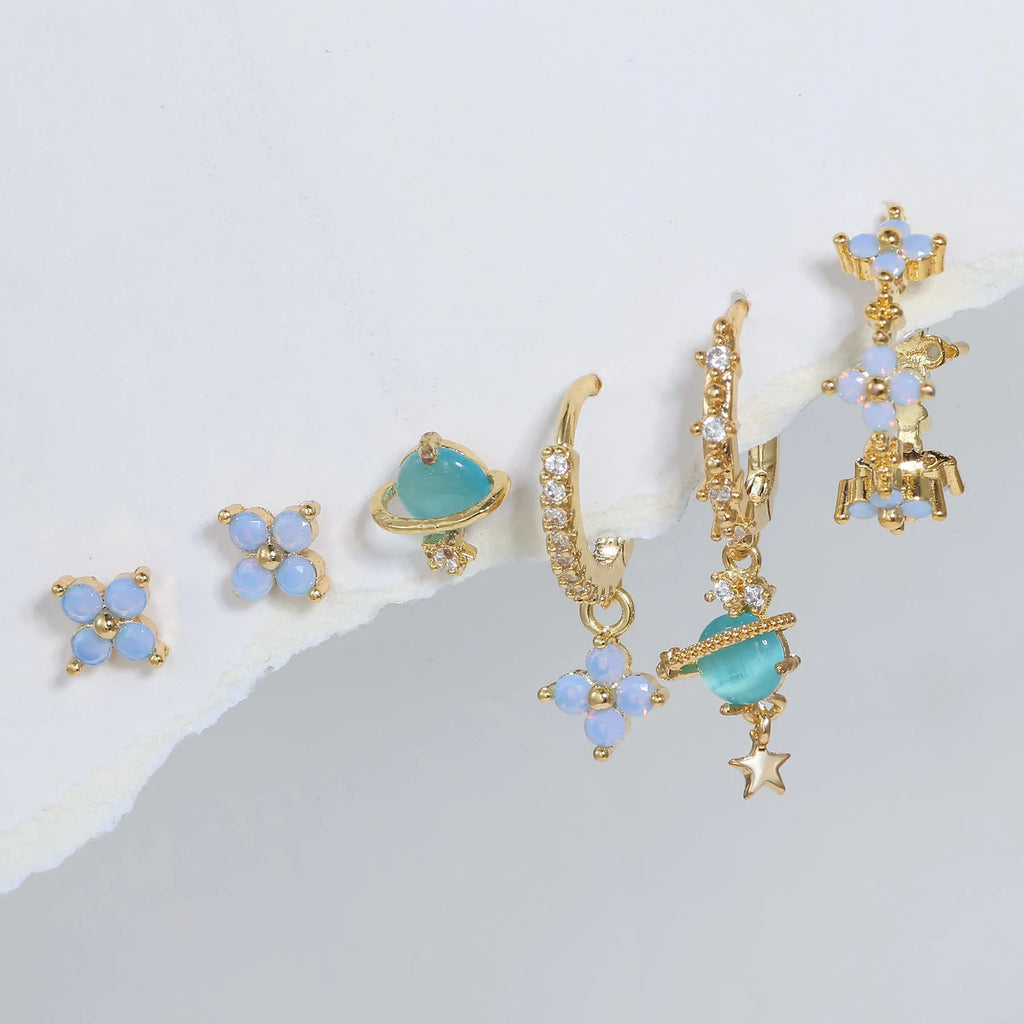 Gold and silver floral stud earrings with zircon detail in a Japanese Korean sweet girl style.