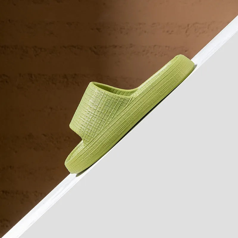 Soft EVA non-slip toe ring flip flop slippers for adults in multiple colour options on a plain background.