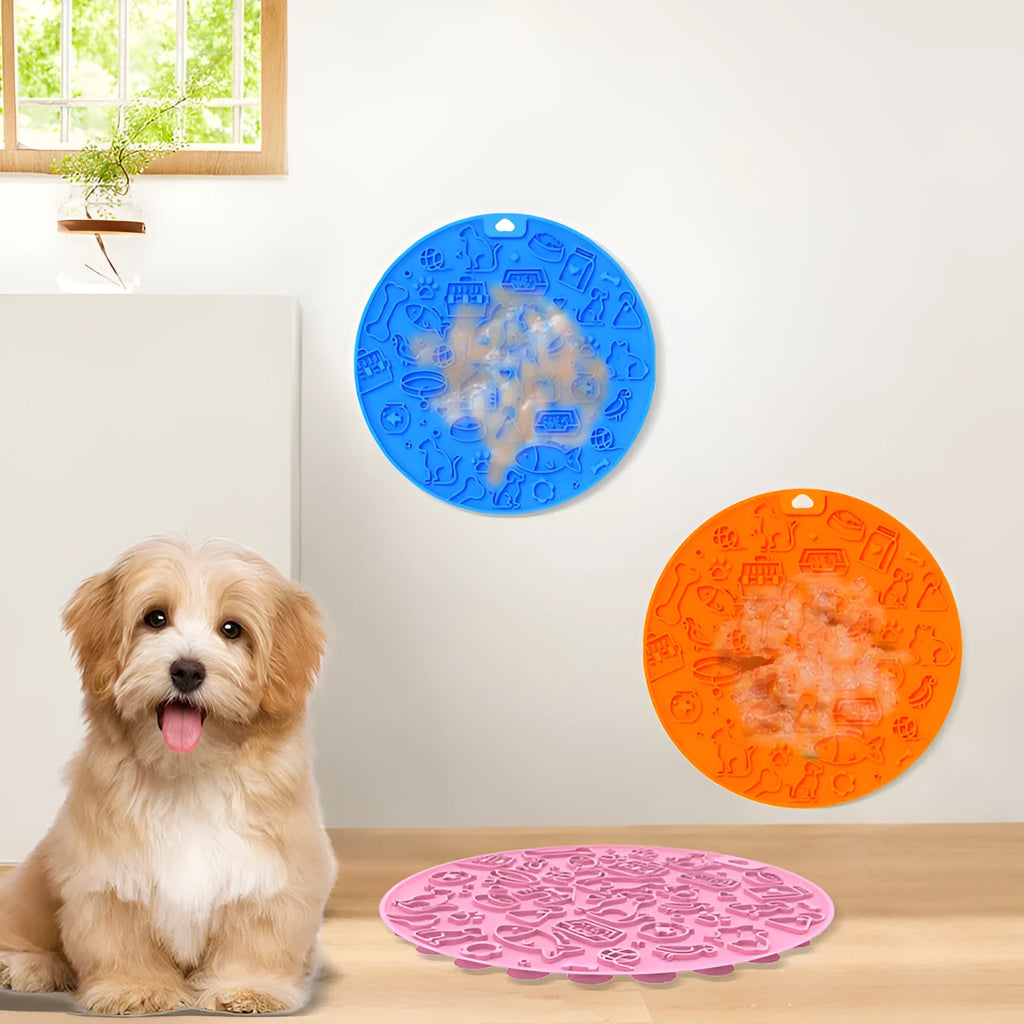 Round silicone pet licking mat with textured surface and a central suction cup, shown in mint green colour.