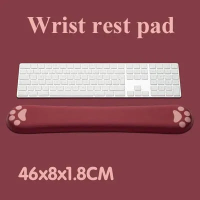 Cat's claw cartoon design memory foam keyboard wrist rest in blue on a desk