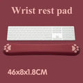 Cat's claw cartoon design memory foam keyboard wrist rest in blue on a desk