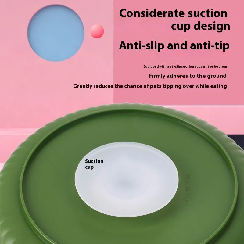 A rotating plastic pet feeding game board with an anti-choke pad and a detachable silicone licking mat in a windmill pattern.
