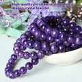 Natural transparent charoite crystal bracelet with platinum setting, showing different bead size options on a wrist.