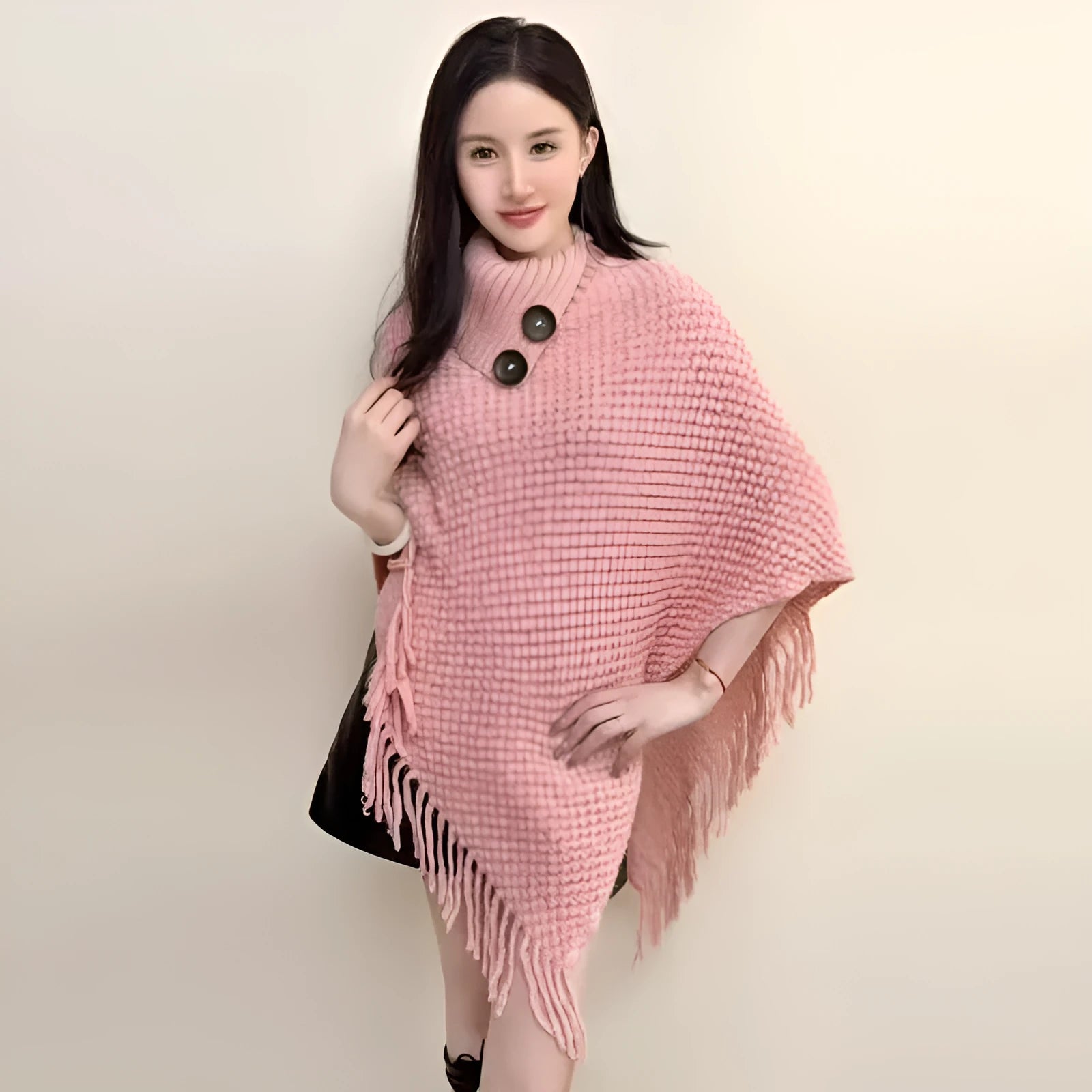 Women's plush triangle shawl cape in a cashmere blend with tassel detailing, shown in wine red.