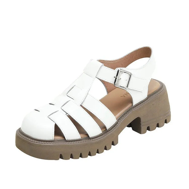 Women's black retro platform sandals with closed toe, chunky rubber sole and buckle fastening