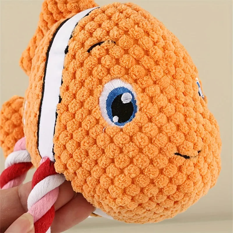 Grey turtle-shaped dog chew toy made with knotted rope and soft stuffing.