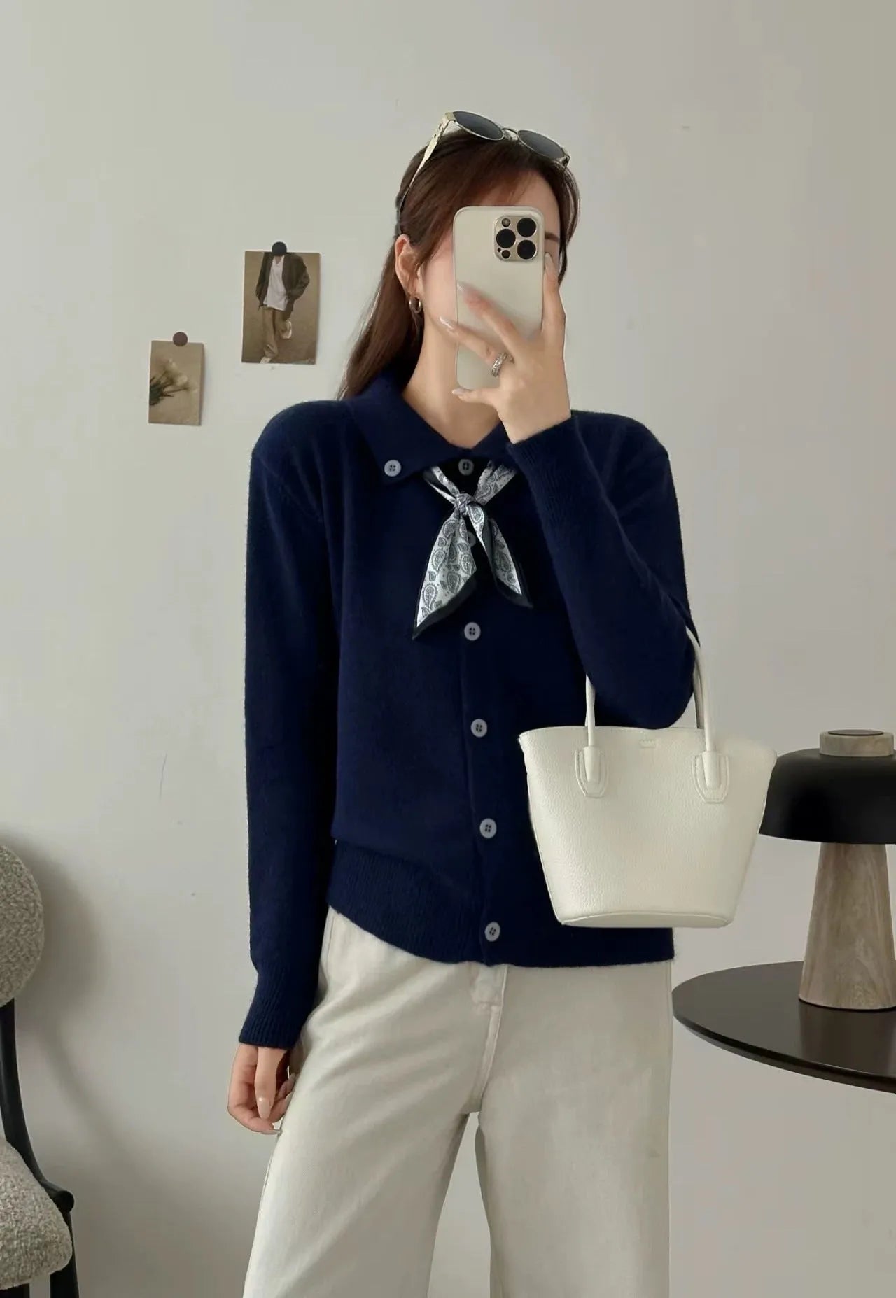 Beige lapel scarf style acrylic cardigan sweater with long sleeves and splicing detail.