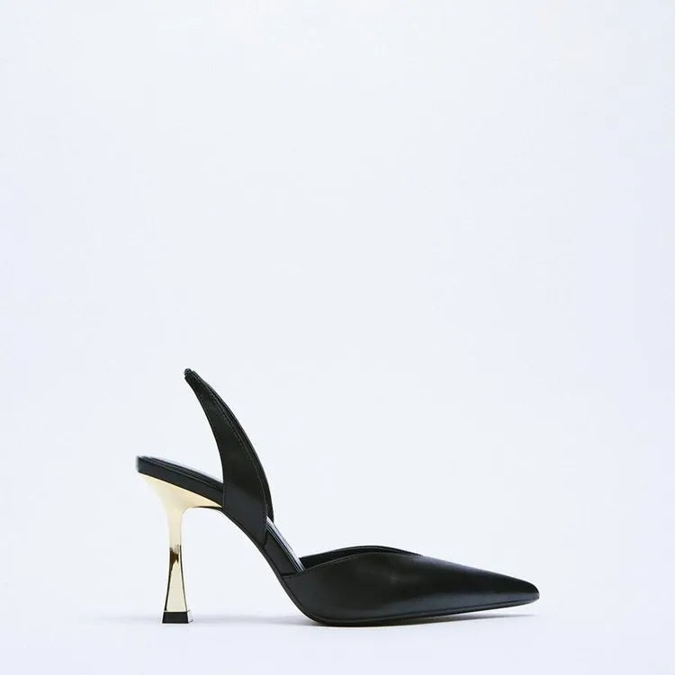 Women's pointed patent leather high heels in apricot colour on a white background.