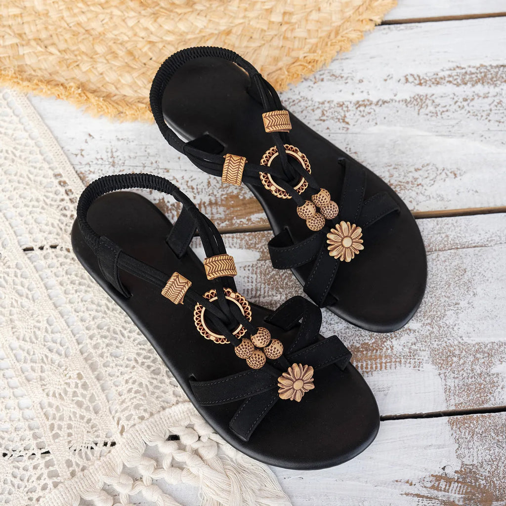 Black ethnic style women's flat sandals with beaded decoration and elastic band fastening
