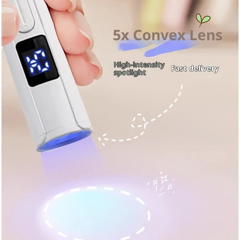 Small portable white handheld hot lamp for nail phototherapy with power storage