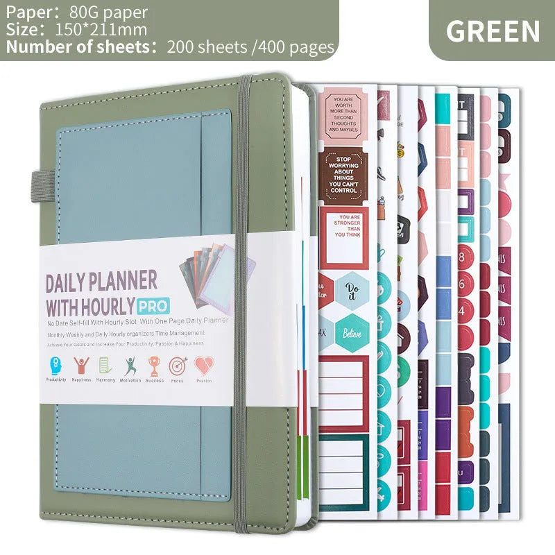 A5 notebook with PU leather cover in various colours, shown open to reveal blank pages and planning stickers.