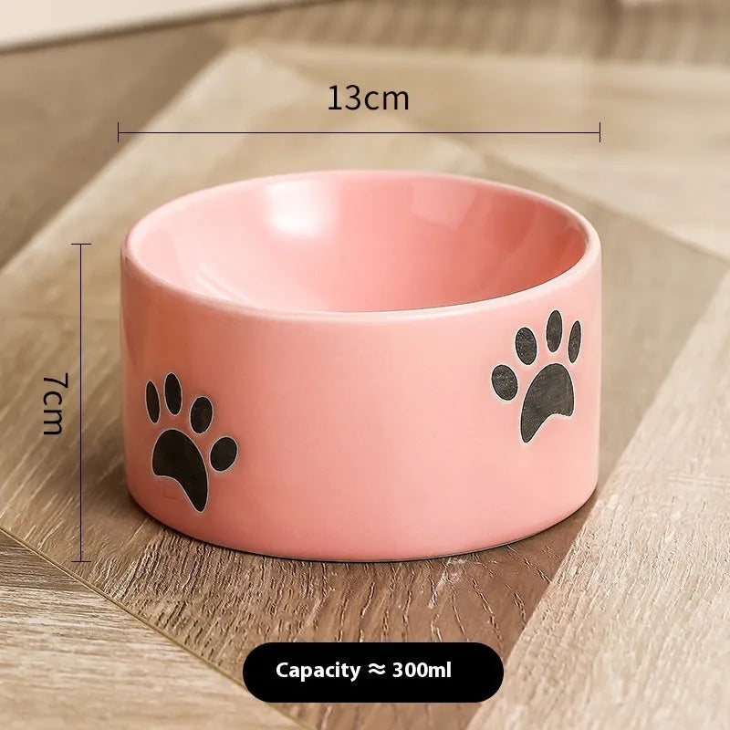 Ceramic cat bowl with high-foot design and cat's paw pattern in choice of colours