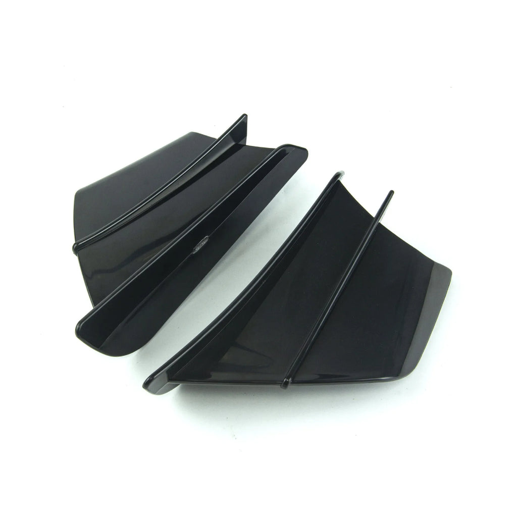 Set of two universal motorcycle spoiler wings for air diversion, showing four available finish options.
