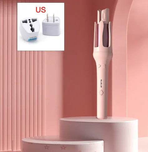 White and Chigo brand automatic hair curler with a 32mm barrel on a table.