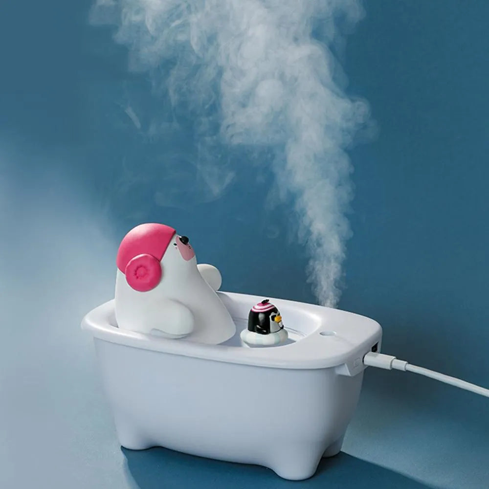 White USB air humidifier with 550ml water tank showing mist output and control buttons