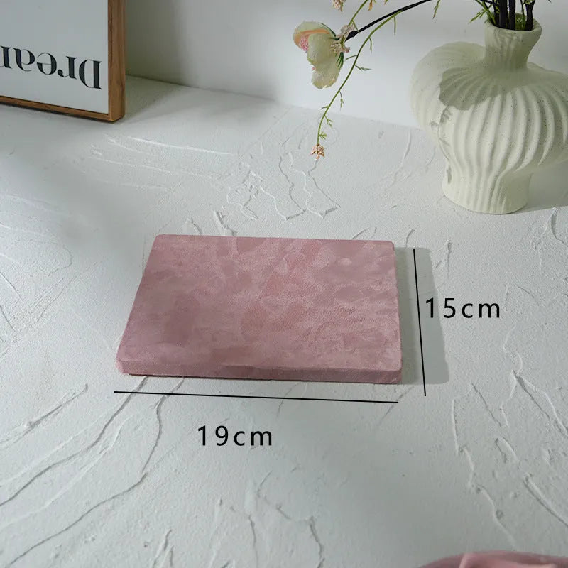Flannel jewellery display stand in light blue with gypsum base showing 15cm round plate