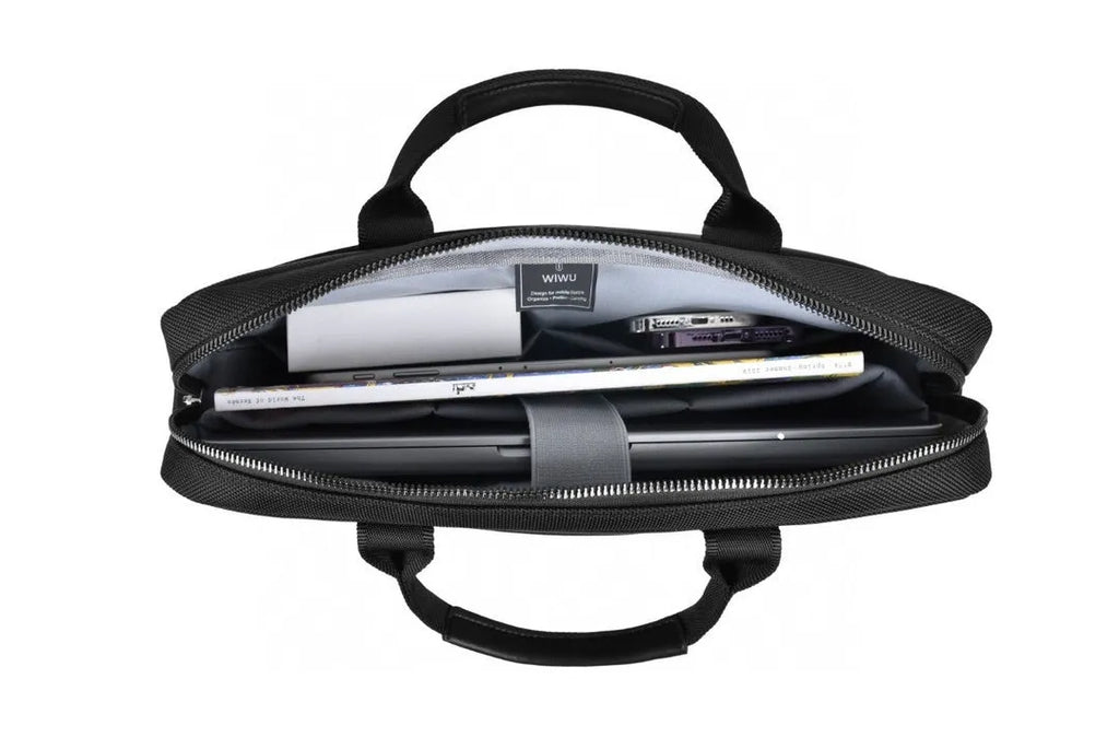 Black oxford cloth multi-pocket laptop handbag shown open, revealing separate padded computer layer and internal organisers.