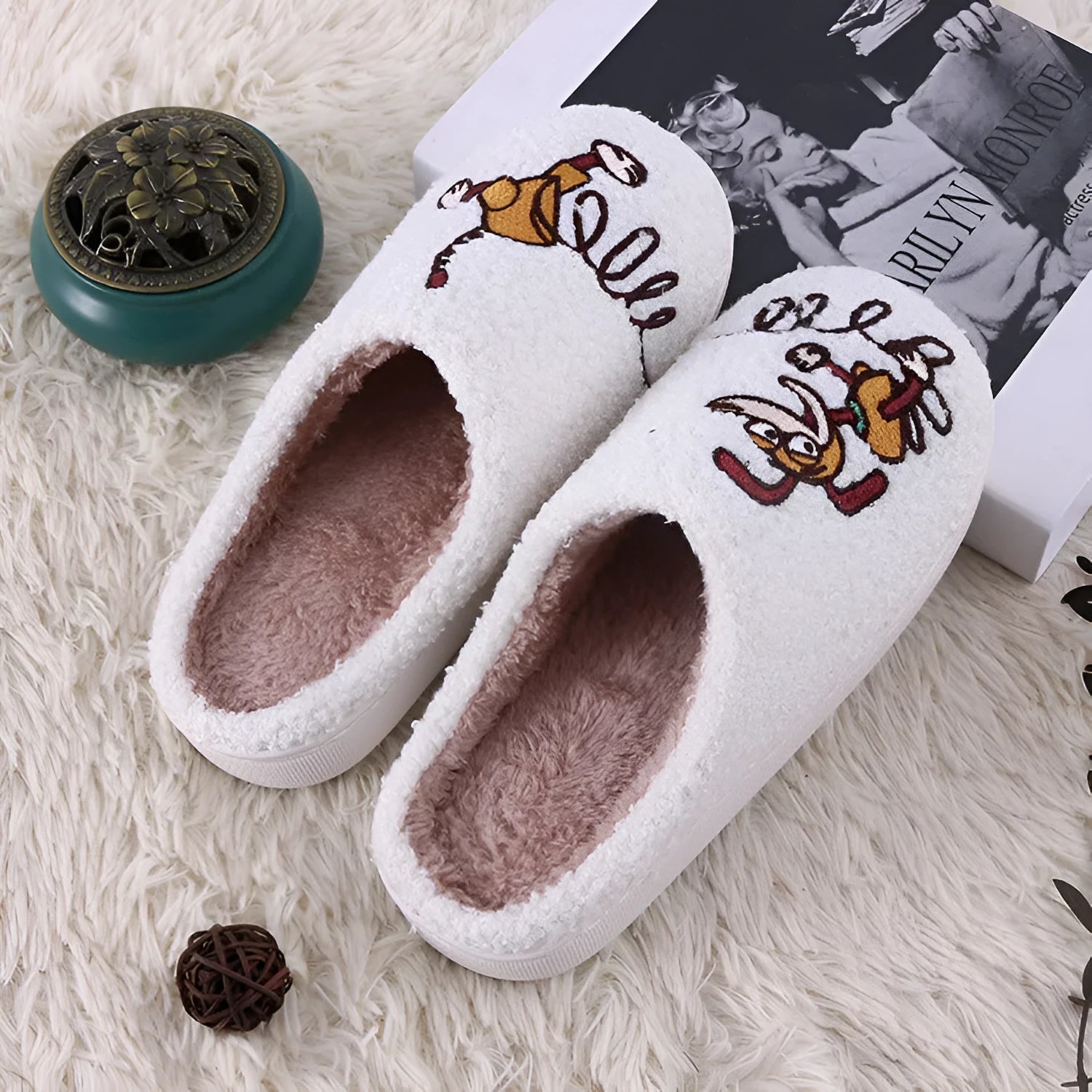 White cartoon pattern plush toe holder slippers with a non-slip rubber sole.
