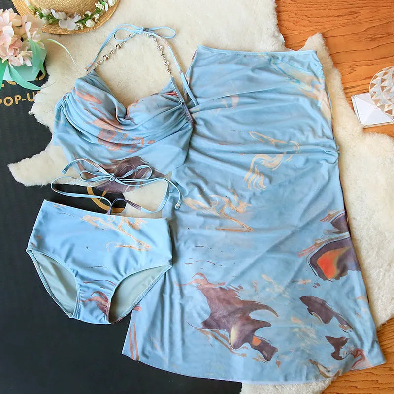 Women's blue printed triangle bikini top and skirted bottom three-piece swimsuit set with steel wire support