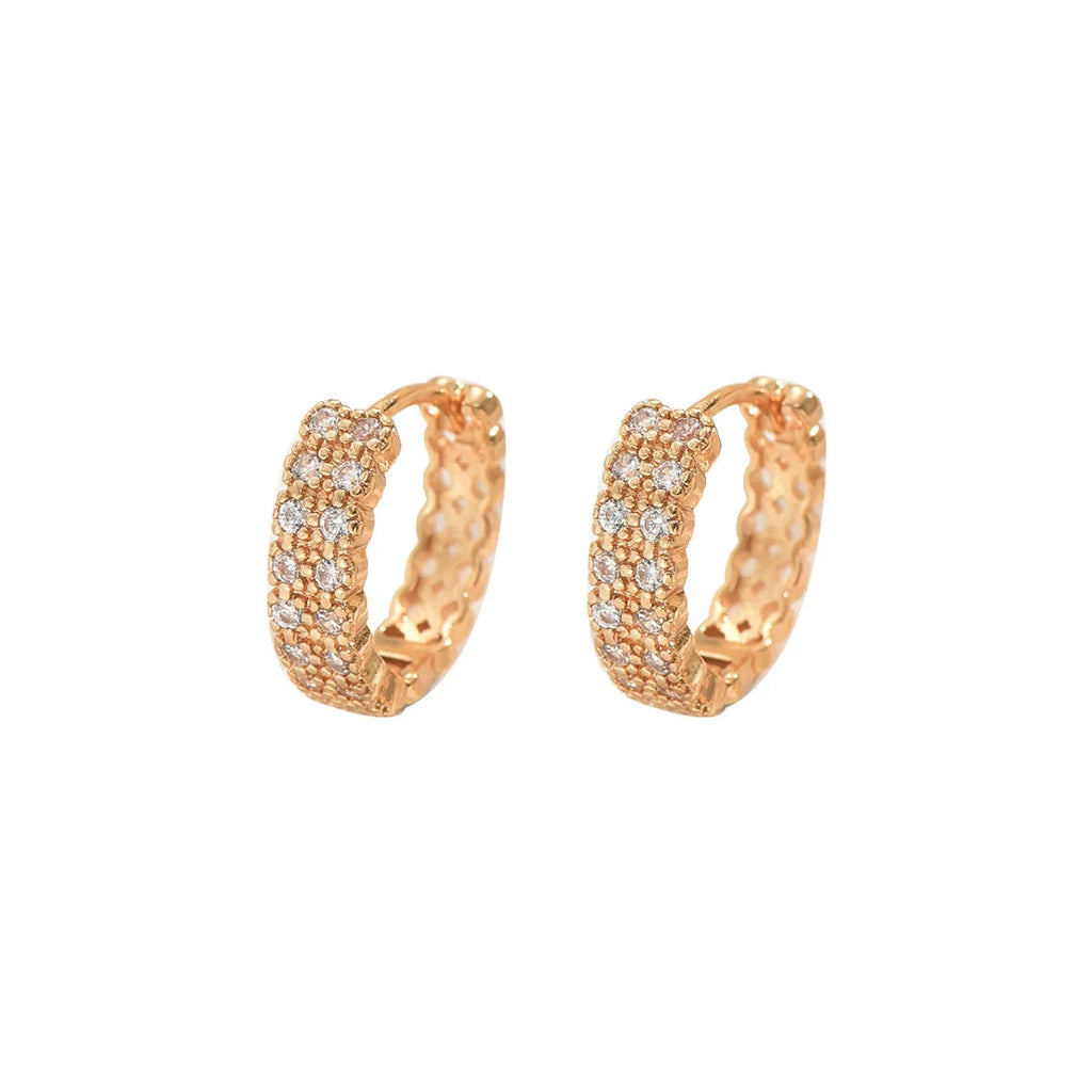 A pair of copper geometry pattern ear studs with round, dot and ring designs in colour DE20288.