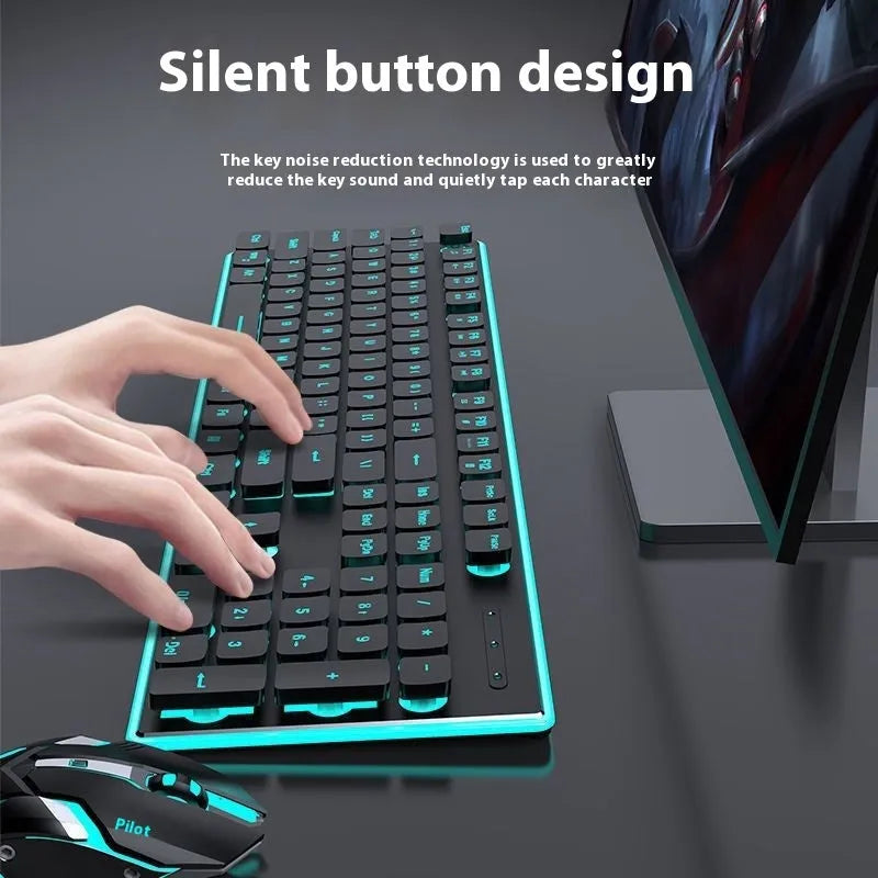 Wireless mute Bluetooth keyboard in pink or white on a desk next to a phone.