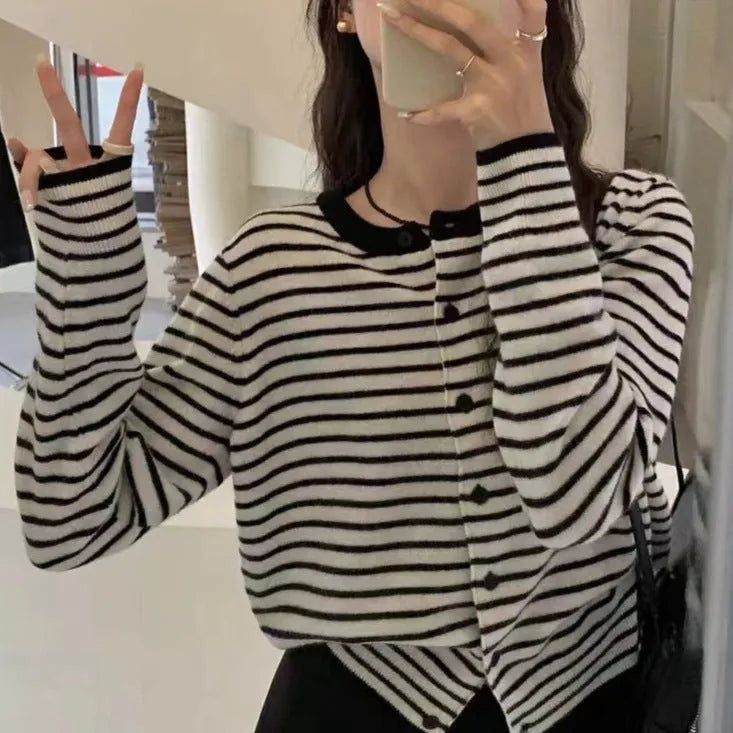 Dark gray and white striped women's cardigan coat with long sleeves and a slim fit.