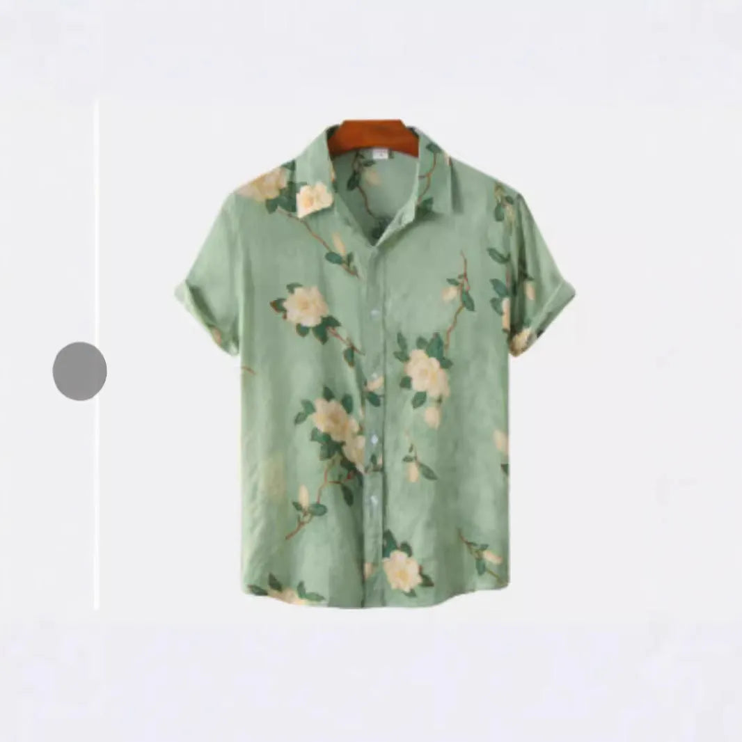 Man's short sleeve Hawaiian print shirt with lapel collar and floral pattern, shown in a casual setting.
