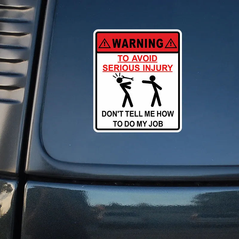 Adhesive car glass warning sticker measuring 14.9cm by 12.6cm.