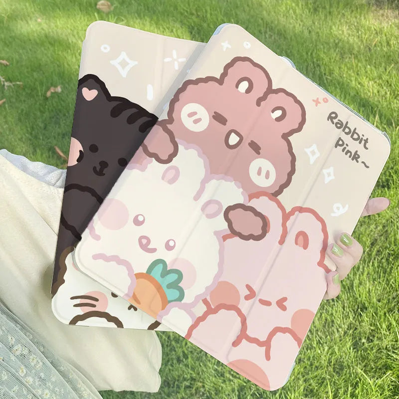 Rabbit cartoon design on a grey silicone iPad case shown folded into a stand position.