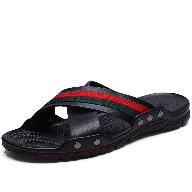 Men's white cowhide leather flip-flops with a PU sole on a sandy beach