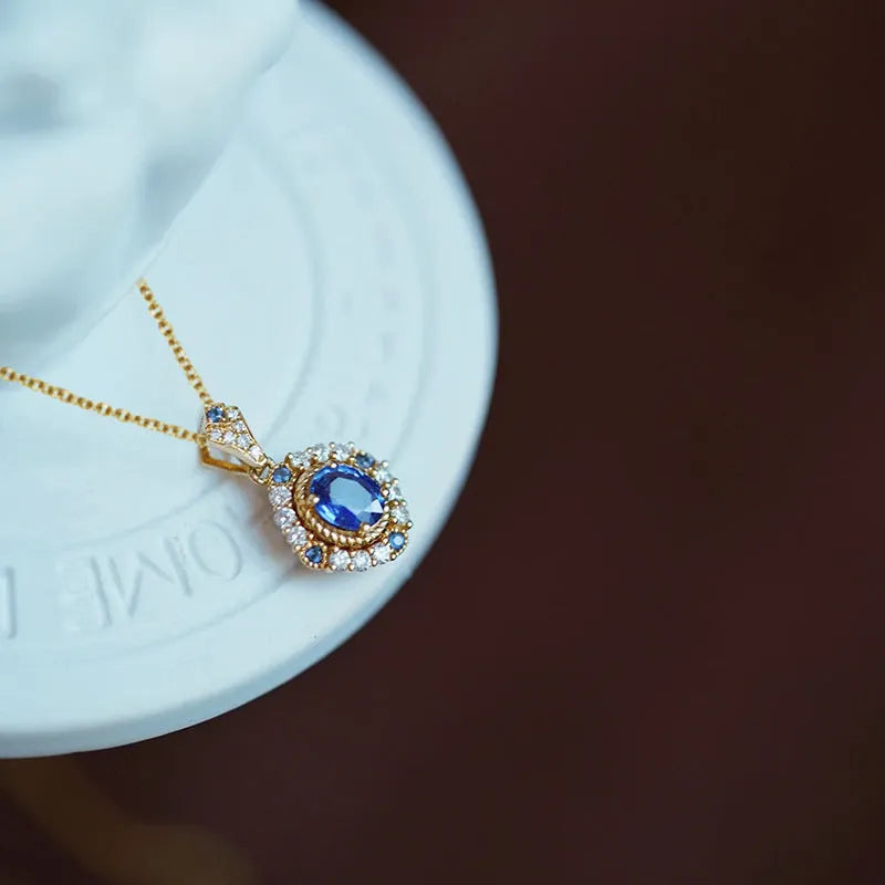 Huitan yellow gold colour necklace with mixed gem and zircon pendant on an adjustable box chain.